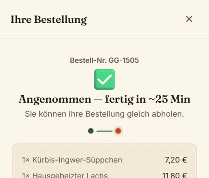 Nahaufnahme: Kunde sieht Bestellstatus „Angenommen – fertig in circa 25 Minuten“